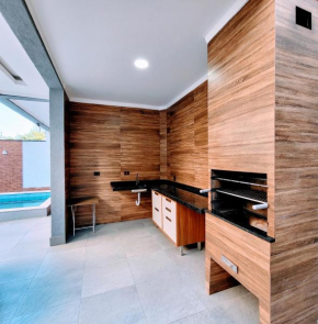 Casa Encantadora com área gourmet, piscina e mar